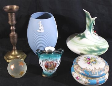Table deal of porcelain items and brass candlestick