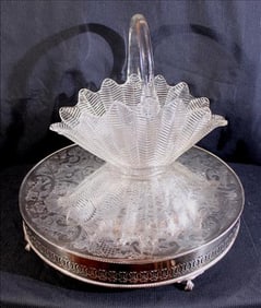 Silver-plate cake stand with glass handled basket