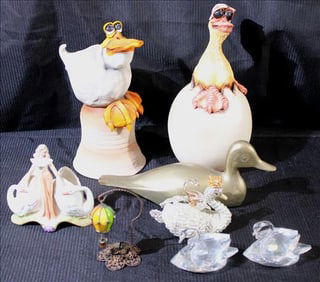 8 piece table deal of crystal swans, brass duck, hatching duck, etc.