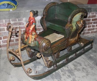 Heavy sleigh, hand painted all over with lady on bow