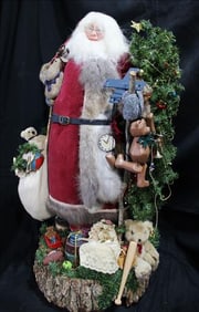 Santa standing on a real wood log carrying all kinds of toys, 30 in. T.