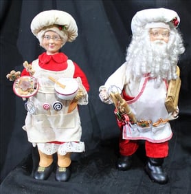 Santa has been cooking cookies along with Mrs. Clause, free standing
