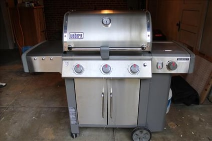 Stainless steel Weber Barbeque grill, used 5 times, keep in basement