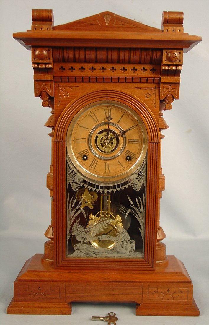 Gilbert Pandia Clock, 21in. T, 13in. W, excellent c: Gilbert Pandia Clock, 21in. T, 13in. W, excellent condition