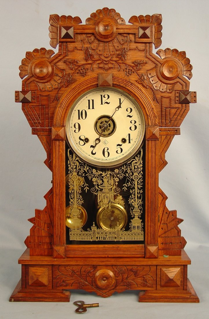 Gilbert Forrest Clock, burl leaves, ca. 1891, 25in.: Gilbert Forrest Clock, burl leaves, ca. 1891, 25in. T, 16in. W