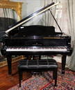 Electric baby grand piano, Young Change, with ebony finish
