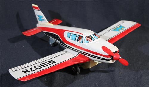 Beechcraft tin battery operated airplane in original box: Beechcraft tin battery operated airplane in original box, 10 in. L, 14 in. W.