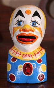 Cast iron clown  bank, ca. 1925, 5 in. T.