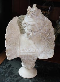 Marble bust of lady in a lace dress, has several small chips, 17 in. T.