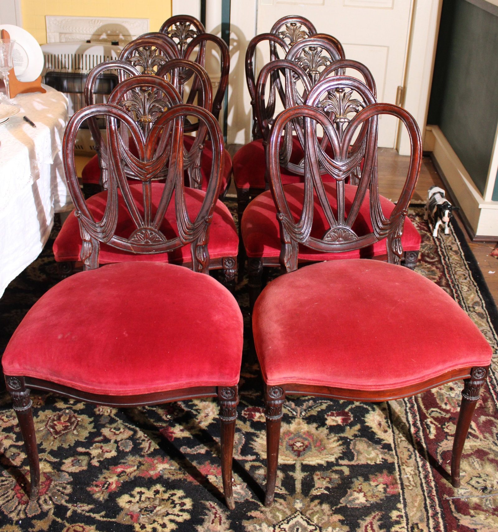 8 piece machogany regency style chairs with red velvet upholstery: 8 piece machogany regency style chairs with red velvet upholstery, no arm chairs, 38 in. T, 18 in. W, 22 in. D.