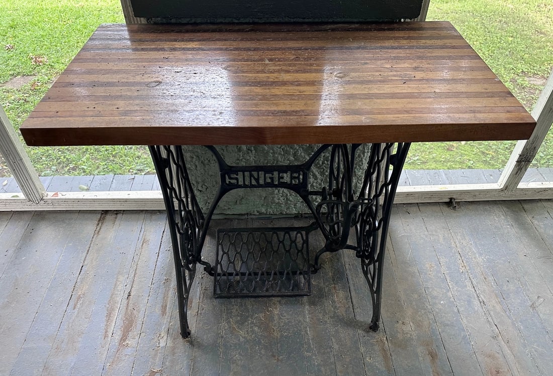 Old singer sewing base with butcher block top, 29 in. T, 36 in. L. (1 of 2)