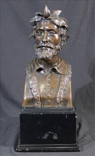 Bronze Bust on Wooden Base: Bronze bust depicting a bearded man crowned with laurel leaves, exuding classical elegance and timeless artistry. Detailed facial features and period attire are beautifully cast, resting atop a polish