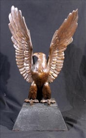 Bronze eagle perched on plinth, 20 in. T, 12 in. W