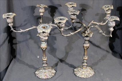 Pair of solid bronze 4 arm candelabras, 16 in. T, 16 in. W.