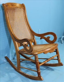 Antique Walnut Caned Rocking Chair