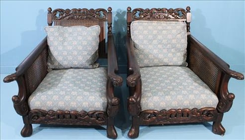 Pair of Edwardian carved mahogany chairs with cain back and sides, 73 in. T, 31 in. W, 28 in. D