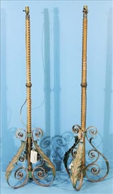 Pair of wrought iron leaf base pole lamps with pinned fabric on poles, 65 in. T, 17 in. W