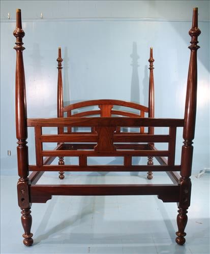 Rosewood Indian 4 Poster Bed, Late 19th Century: Stately antique Indian rosewood four-poster bed featuring turned and fluted posts with shaped head and footboards. Full-size bed frame with rich grain and elegant form, dating to the late 19th century