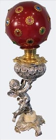 Silvered Figural Oil Lamp with Cased and Enameled Ruby Shade