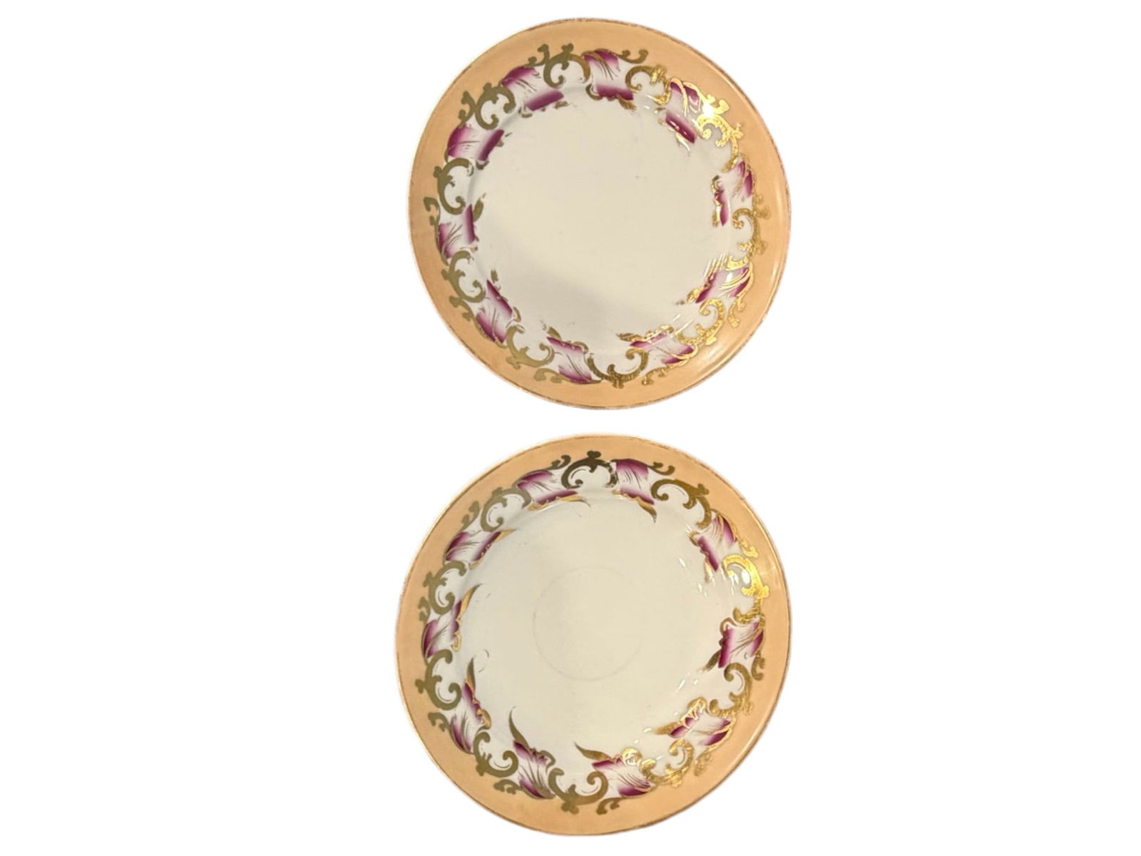 Old Paris Porcelain Dinner Plate & Soup Bowl, Pelham Family Descent: Old Paris porcelain dinner plate and rimmed soup bowl, mid-19th century, each decorated with a scrolling gilt foliate border embellished with vibrant magenta and lavender plumes on a warm peach ground