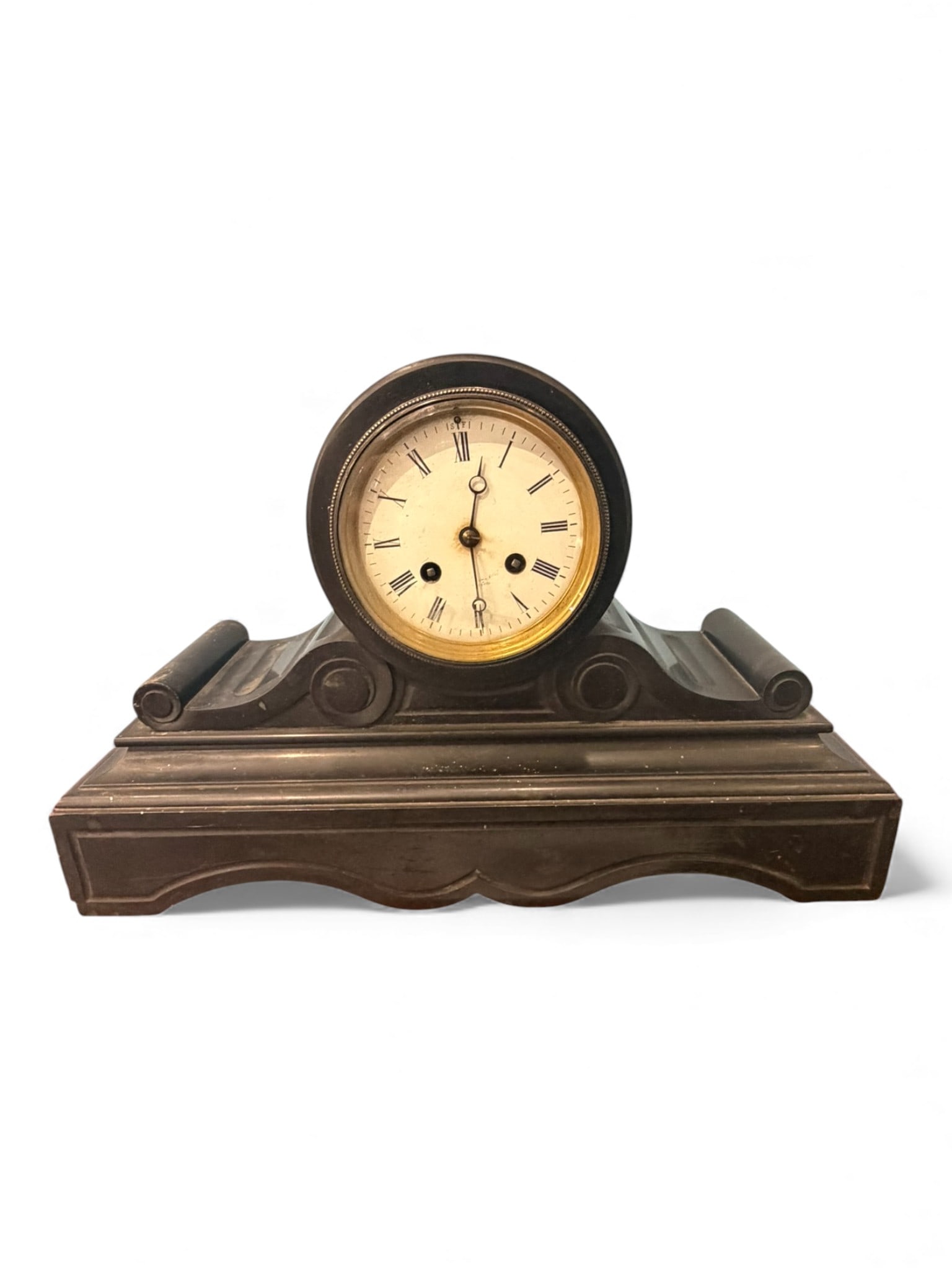 French Black Slate Mantel Clock, Late 19th Century: Handsome French black slate mantel clock, late 19th century, the cylindrical drum housing the dial raised on a molded rectangular base with scroll-form supports. The ivory-toned painted dial features