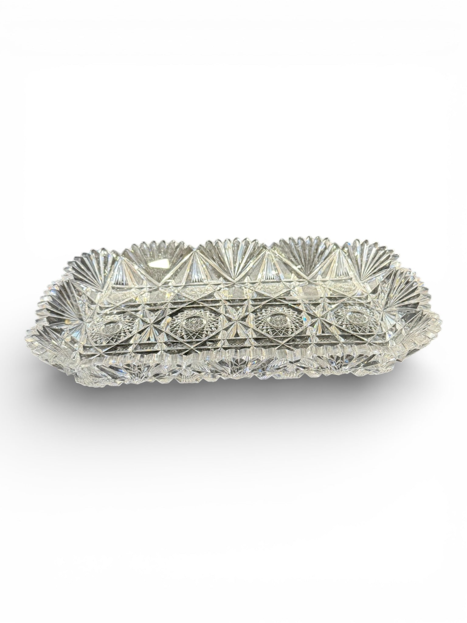 American Brilliant Cut Glass Rectangular Serving Tray: American Brilliant Period cut glass rectangular serving tray, richly decorated with repeating hobstar medallions, fine crosshatching, fan cuts, and diamond point panels. The border features