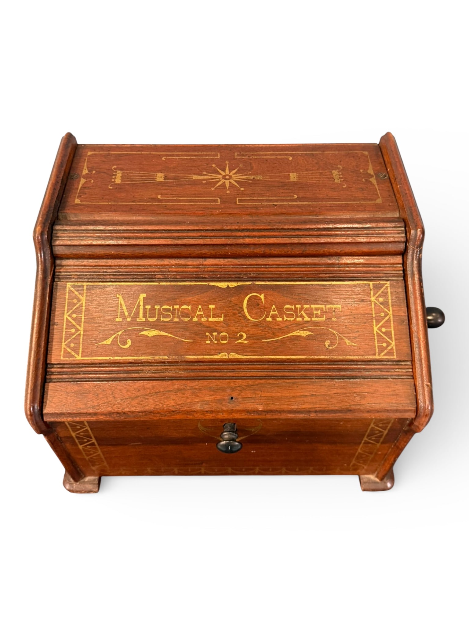 Victorian Rosewood Musical Casket, “Musical Casket No. 2: A charming Victorian mechanical musical casket, the rectangular rosewood case decorated throughout with delicate gilt stenciled ornament, including foliate scrolls, borders, and a central starburst mo