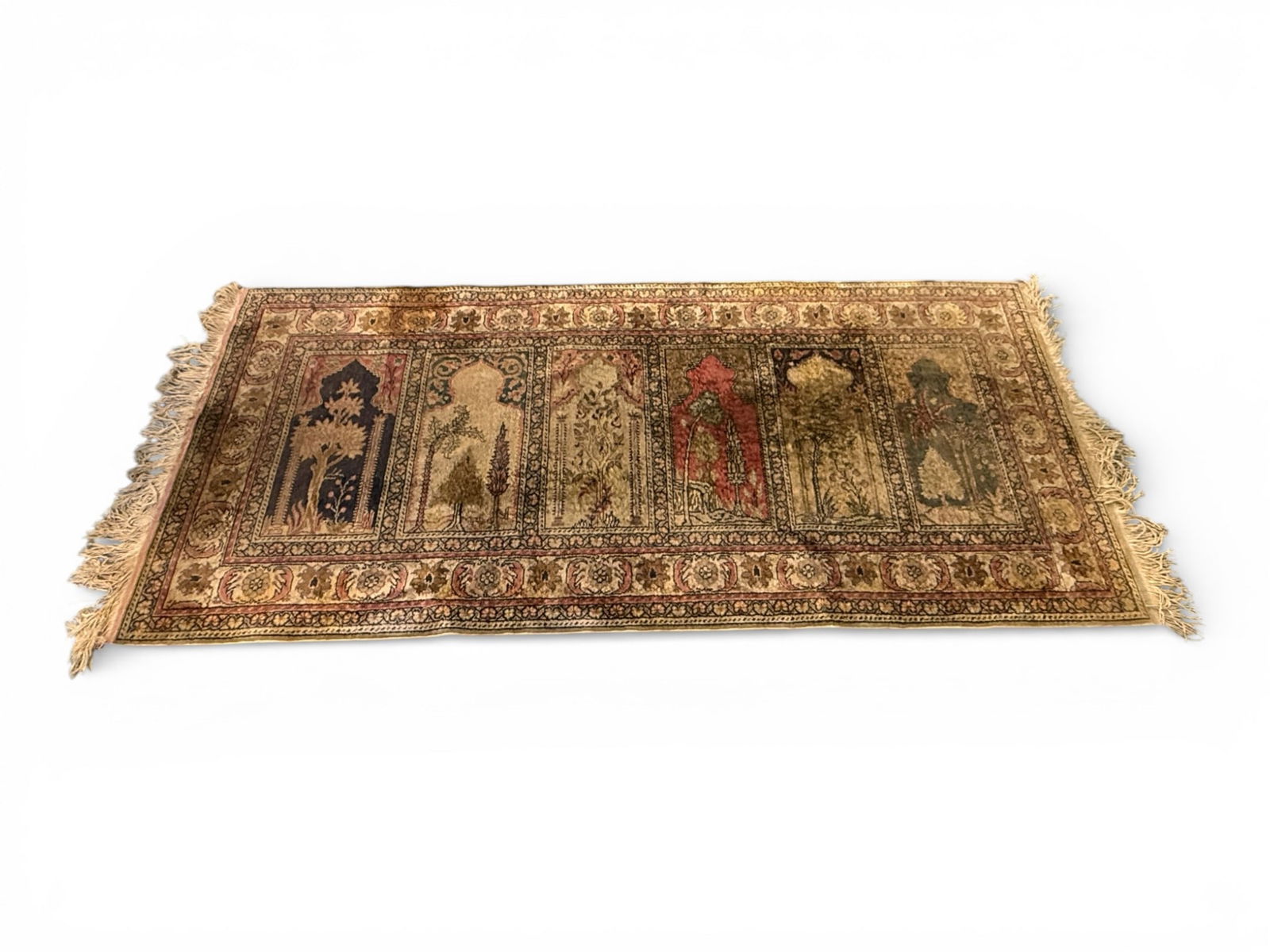 Turkish Prayer-Panel Wool Rug, Early 20th Century: Handwoven Turkish wool rug featuring a striking series of vertical prayer-panel motifs arranged in a stepped mihrab-style layout. The field displays alternating panels with stylized trees, floral