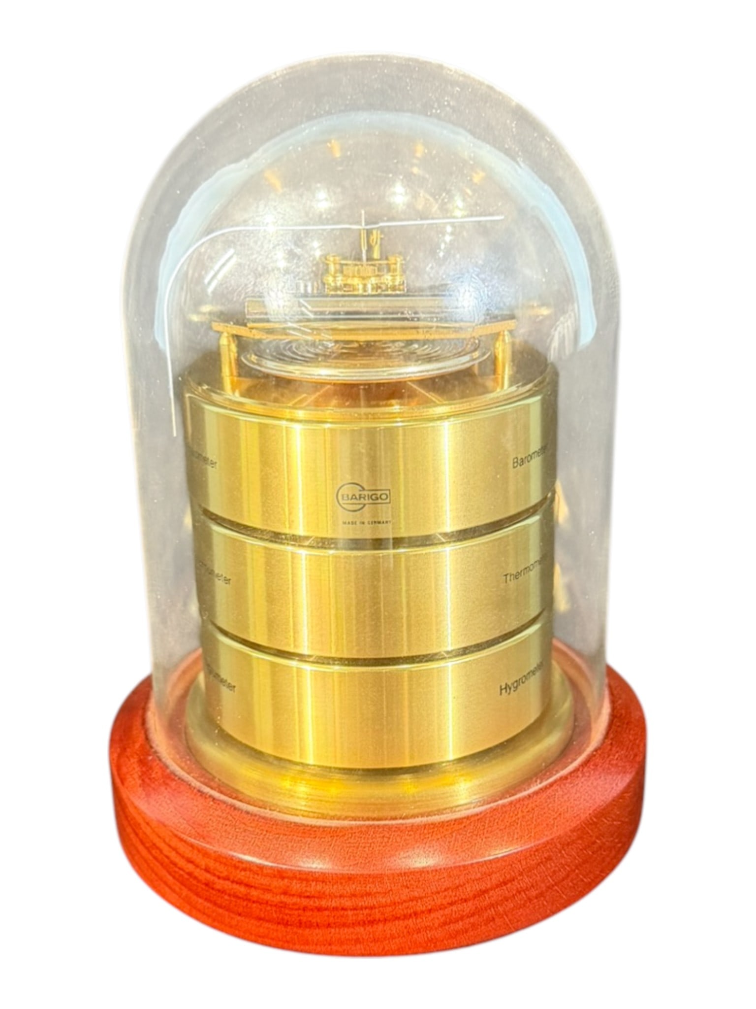 Barigo Desk Weather Station Under Glass Dome: A handsome modern desktop weather station by Barigo (Germany), featuring a polished brass cylindrical housing fitted with three stacked dials labeled Barometer, Thermometer, and Hygrometer. The instru