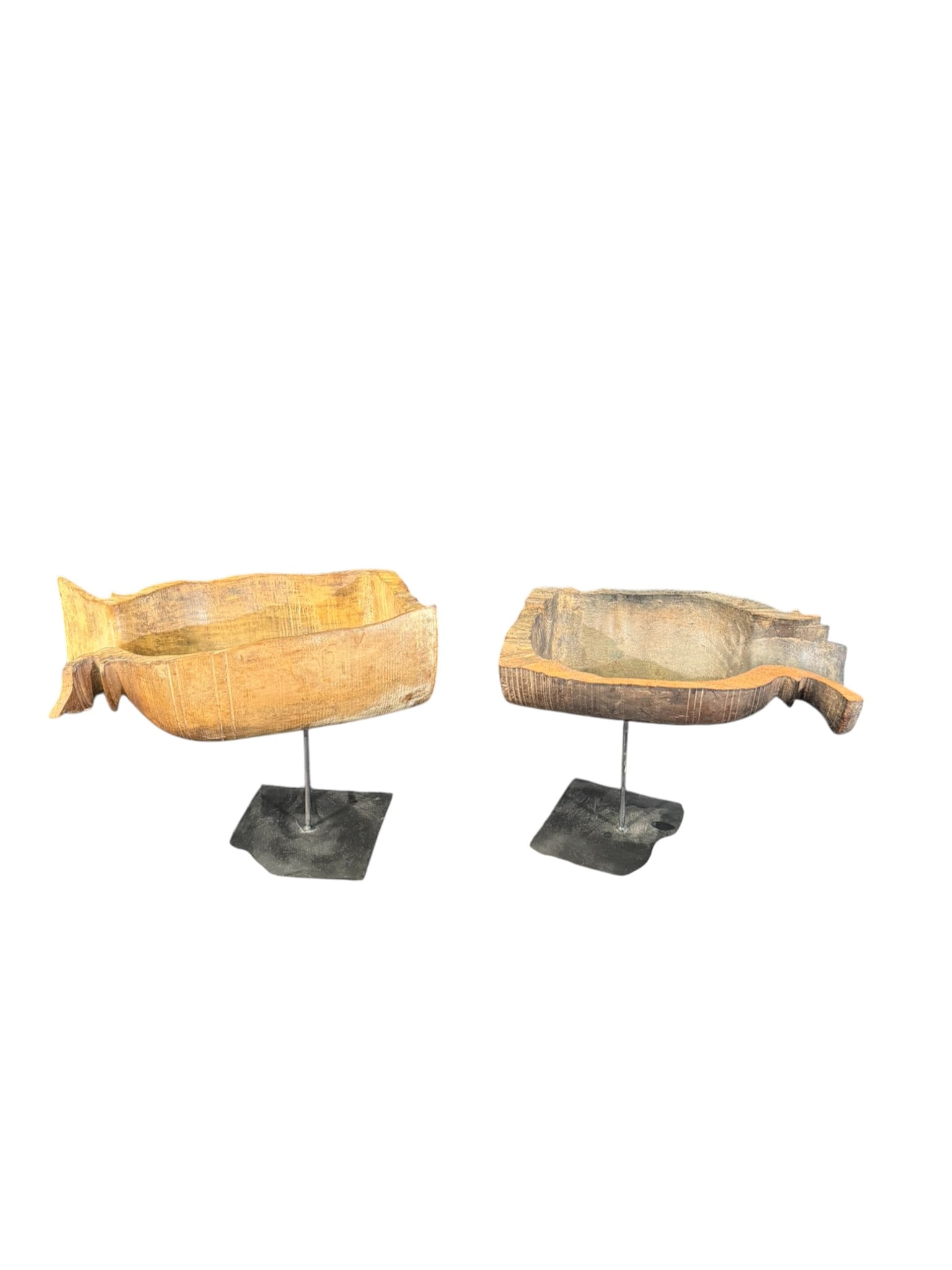 Pair of African Carved Wood Fish-Form Bowls / Sculptures on Stands, early 20th Century: Pair of African hand-carved wood vessels in stylized fish form, each hollowed from a single block with incised linear decoration and projecting tail detail. Likely west or central African and early