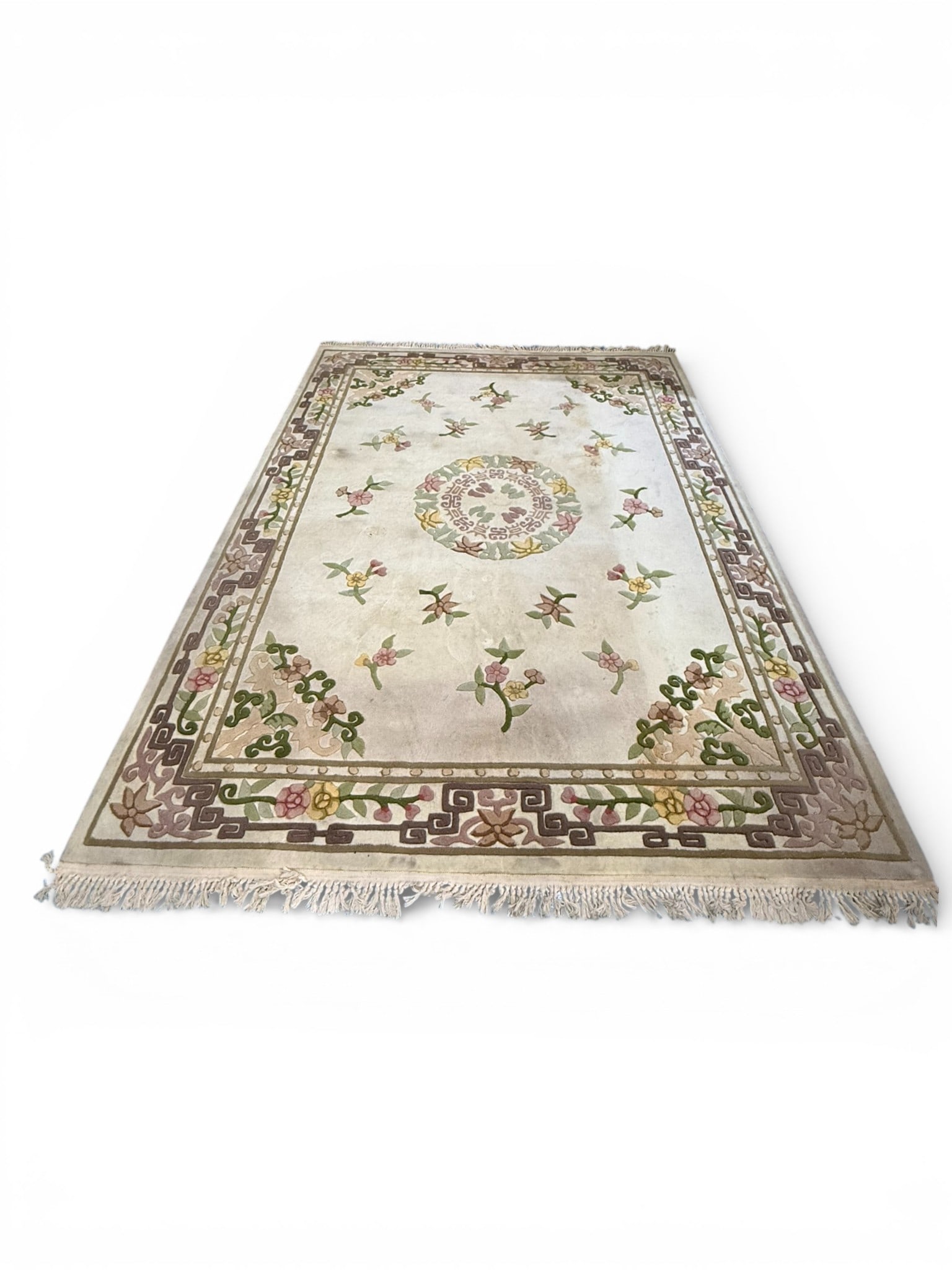 Chinese Style Floral Carpet Rug: Carpet in the Chinese taste, featuring a pale ivory field centered by a round floral medallion with stylized blossoms and scrolling vine motifs. The field is scattered with small flowering sprigs, fra
