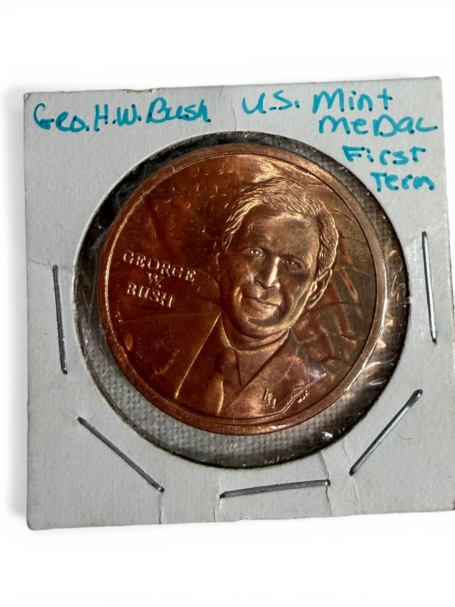 George H.W. Bush U.S. Mint Commemorative Medal - First Term Inauguration (January 20, 1989): U.S. Mint-issued bronze commemorative medal honoring President George H.W. Bush and his first inauguration on January 20, 1989. Obverse features a detailed portrait of Bush, while the reverse depicts