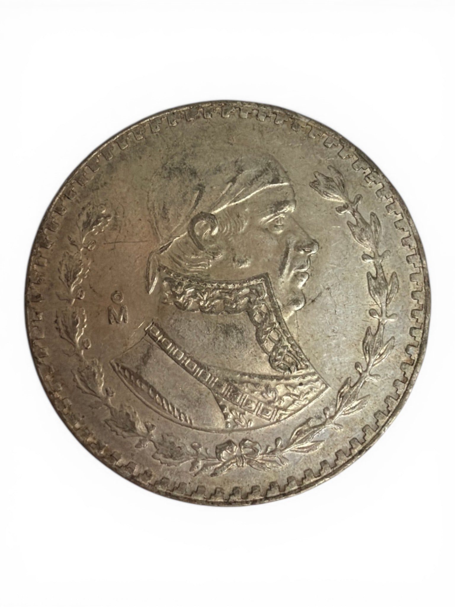 Mexico Silver 8 Reales, Cap & Rays Type (ca. 1890s–1910s, likely Mo Mint): Classic Mexican 8 Reales silver coin featuring the portrait of Miguel Hidalgo y Costilla, hero of Mexican independence, on the obverse, with the national eagle and serpent motif on the reverse.