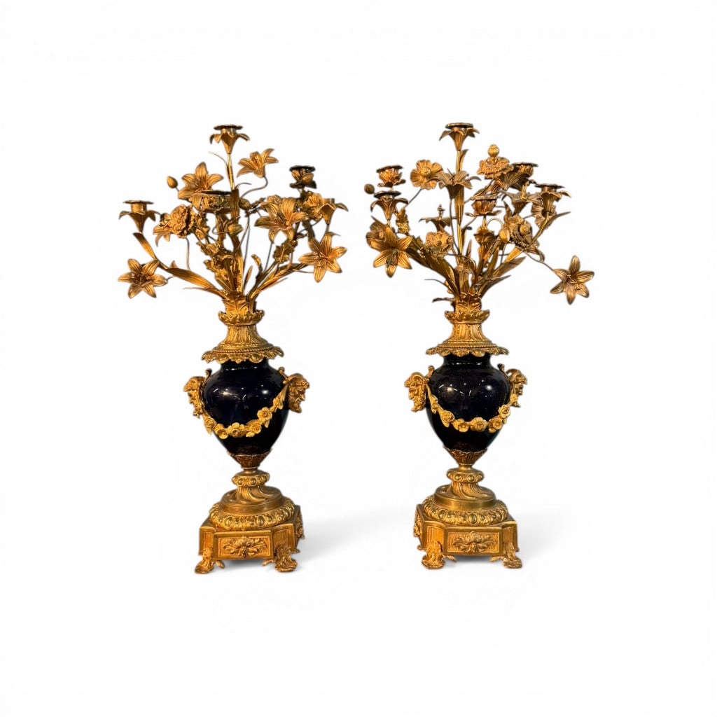 Fine Pair of French Gilt Bronze and Cobalt Glass Figural Candelabra: Pair of French candelabra featuring finely cast gilt bronze floral branches issuing multiple candle arms, rising from richly modeled urn-form bodies mounted with deep cobalt blue glass. The urns are a