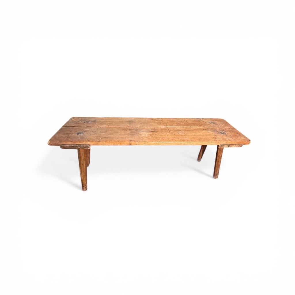American Pine Plank Bench, 19th Century: A 19th century American pine plank bench, probably Northeastern United States, constructed with a thick two-board top secured by large exposed wooden pegs, above splayed round legs joined through a