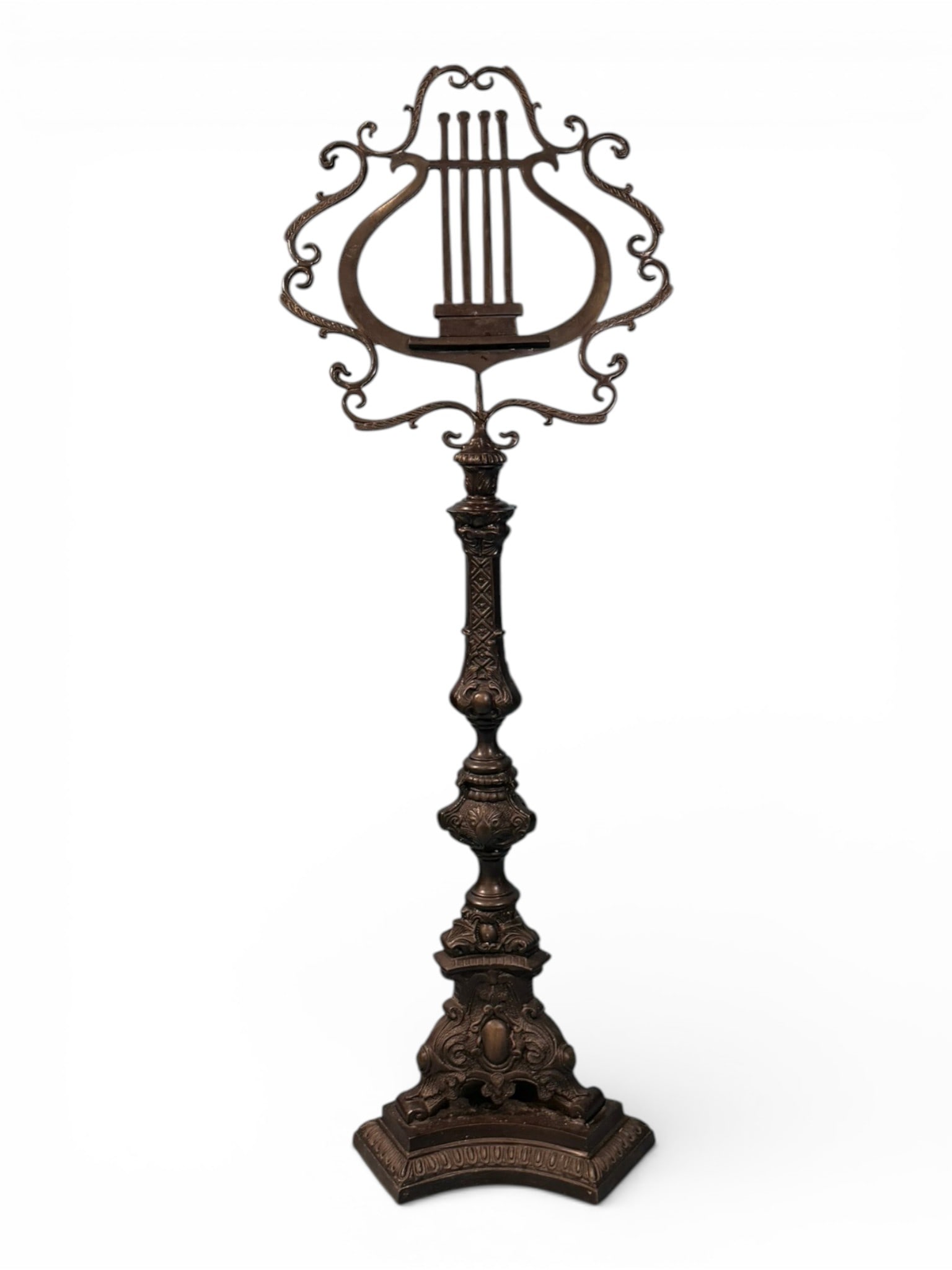 Cast Iron Lyre-Form Music Stand: Cast Iron Lyre-Form Music Stand, late 19th, early 20th century, the scrolling openwork lyre-form rest above a turned and baluster-form standard, raised on a stepped and ornamented base with foliate