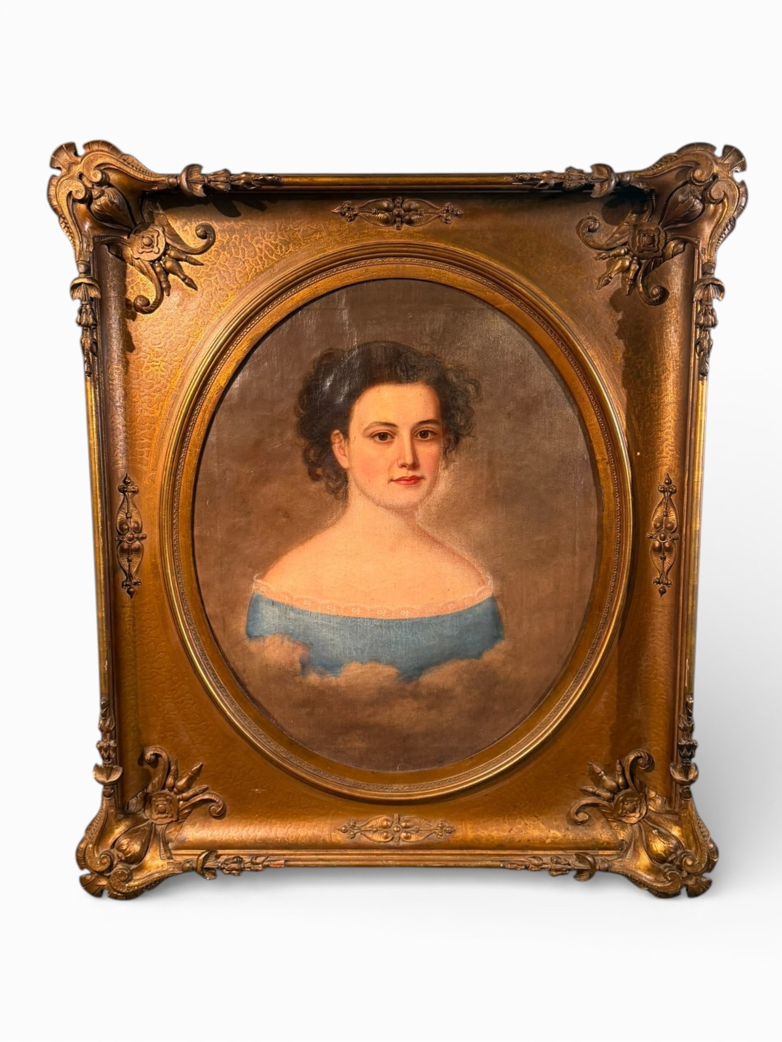 American School Oil on Canvas Post-Mortem Portrait of a Young Woman: American School Post-Mortem Portrait of a Young Woman, oil on canvas, mid-19th century, depicting a bust-length likeness of a young woman with dark curled hair and off-the-shoulder blue dress, rendere