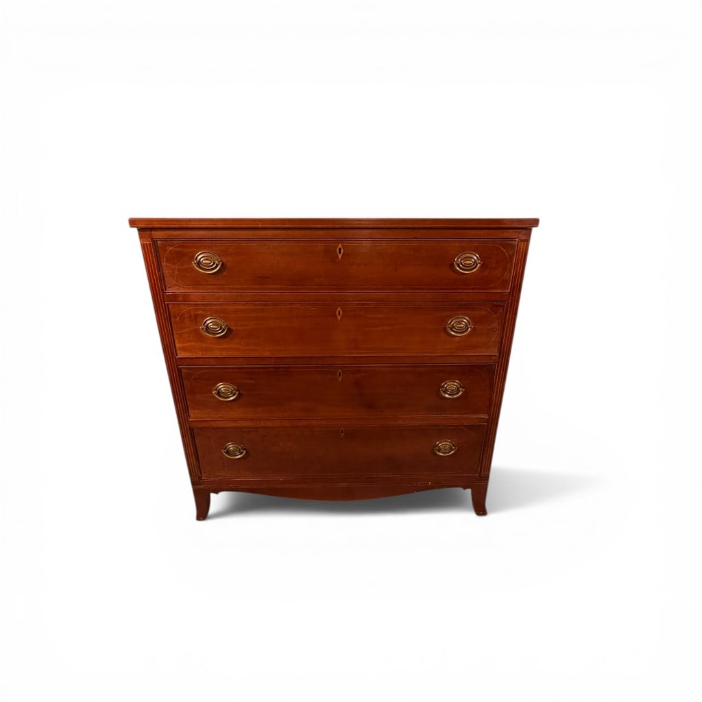 Federal Inlaid Mahogany Four-Drawer Chest: Late 18th to early 19th century Federal period mahogany veneer chest, the rectangular top above four graduated drawers, each outlined with light string inlay and centered with oval reserves, flanked