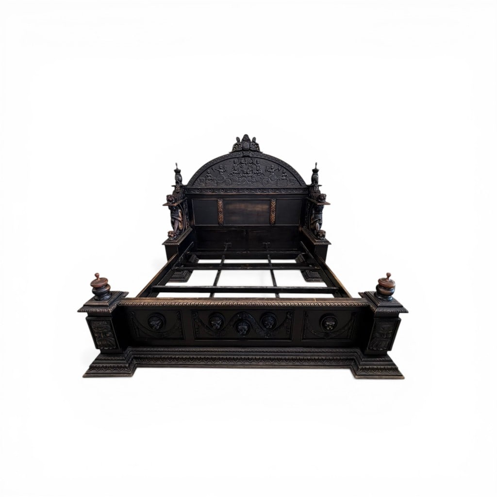 Monumental Renaissance Revival Carved Bed: Monumental Renaissance Revival carved bed, late 19th century, of highly ornate architectural form featuring a commanding arched headboard deeply carved with a figural frieze of putti in procession ami