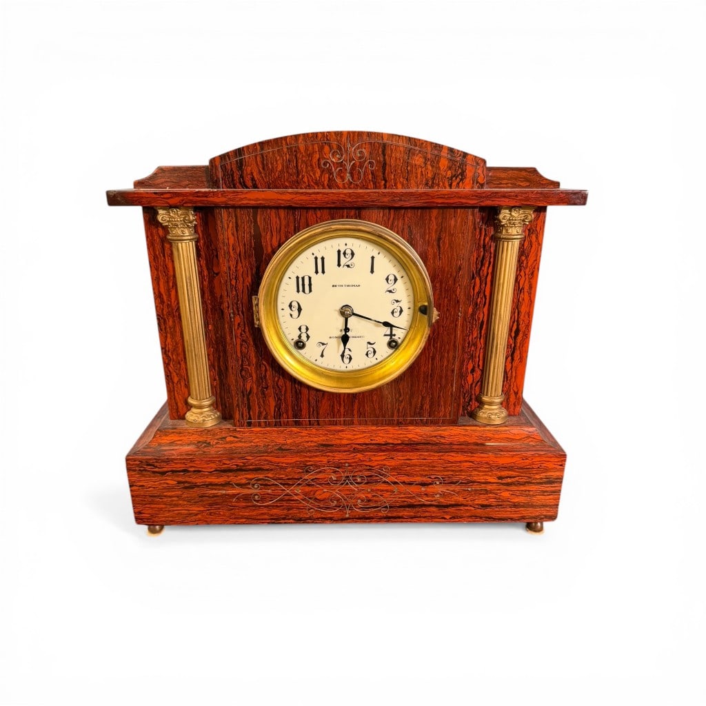 Seth Thomas “Sonora Chime?? Faux Bois Mantel Clock: American mantel clock by Seth Thomas Clock Co., early 20th century, featuring a richly figured faux bois (imitation wood grain) case with ebonized striping, the architectural form accented by gilt