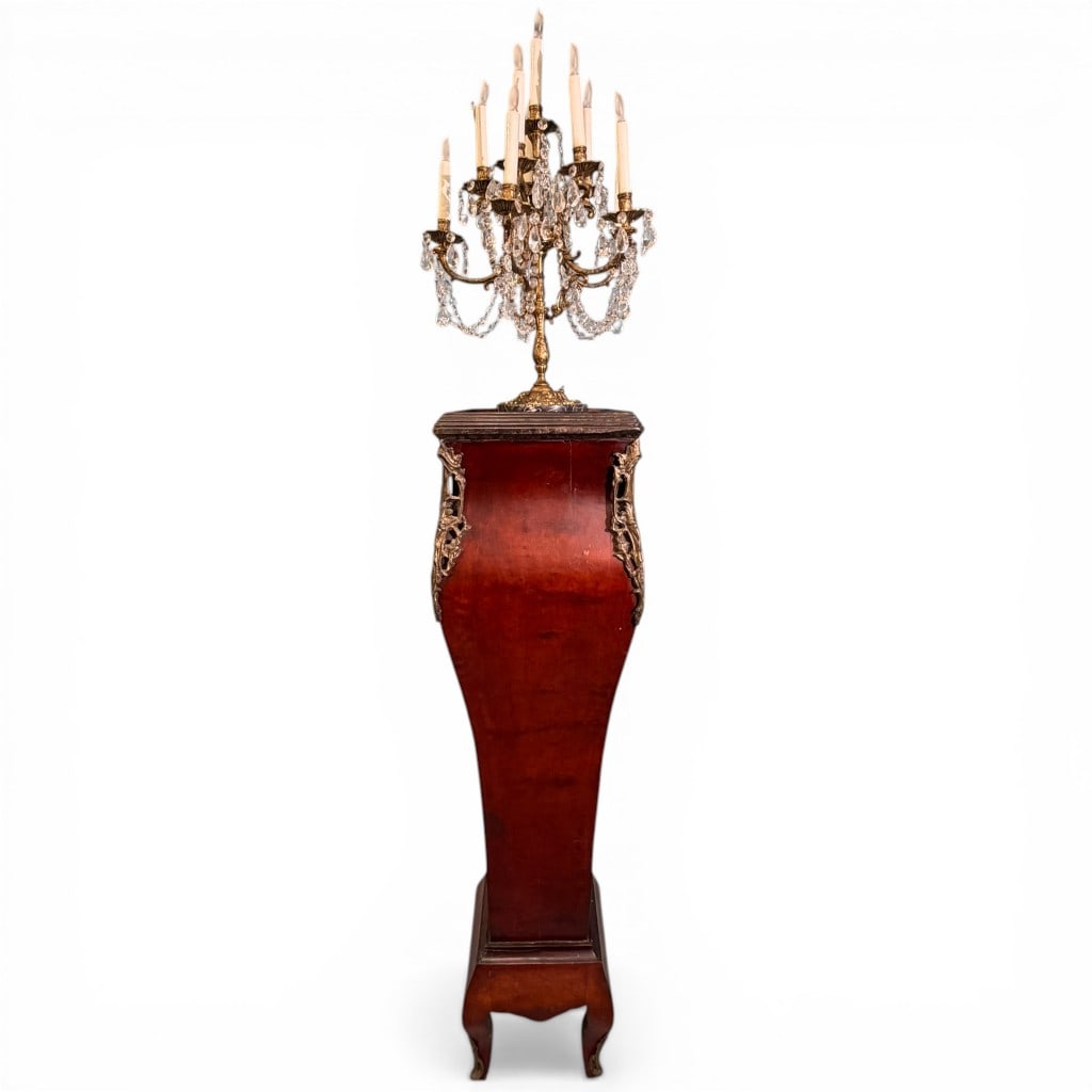 Louis XV Style Mahogany Pedestal Torchiere with Crystal Candelabra Lamp, Two Pieces: A Louis XV-style pedestal torchiere paired with a multi-light crystal candelabra lamp. The pedestal features a shaped mahogany body with a warm reddish finish, rising in a graceful bombe form and acce