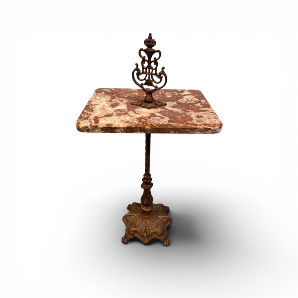 Victorian-Style Marble-Top Smoker’s Stand with Cast Iron Base: An attractive late 19th to early 20th century smoker’s stand, featuring a rectangular red marble top with striking cream and gray veining. The top is supported by a slender, twisted standard leading