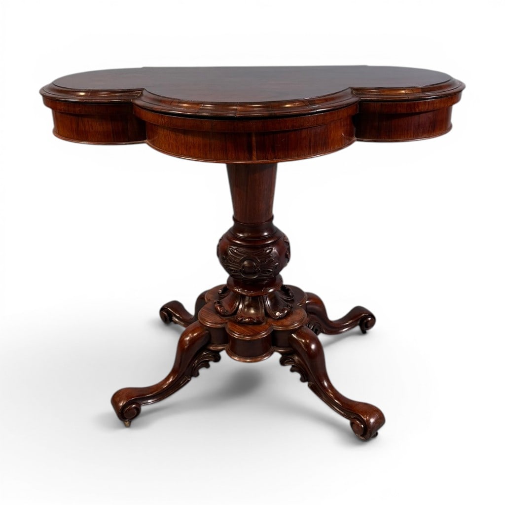 Fine Victorian Rosewood Clover Leaf Card Table: Fine Victorian rosewood clover leaf card table, mid-19th century, having a shaped fold-over top opening to a fitted quatrefoil card surface with black felt inset. The top swivels and opens to reveal a