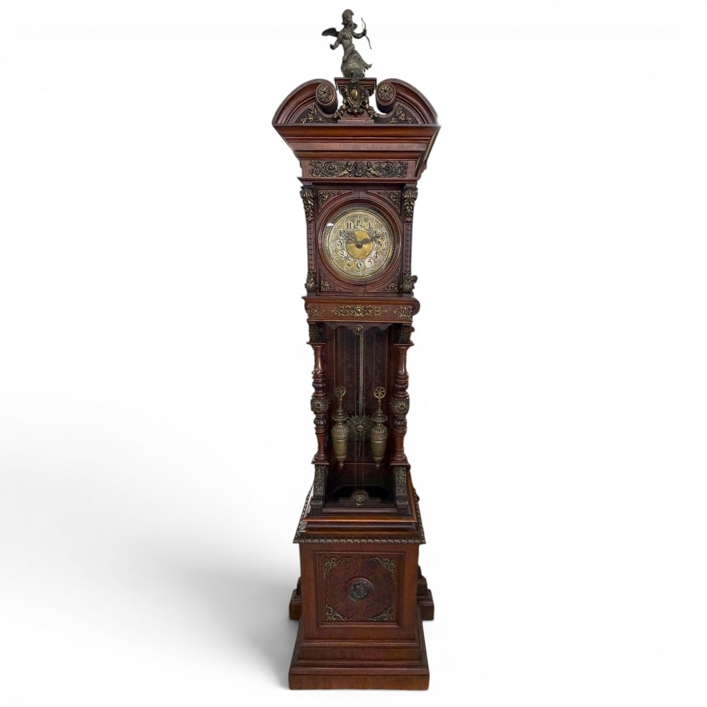 German Renaissance Revival Open-Well Tall Case Clock by Lorenz Furtwängler & Söhne, LFS Marked: A monumental German Renaissance Revival open-well tall case clock by Lorenz Furtwängler & Söhne, Furtwangen, Germany, late 19th century, the highly architectural walnut case richly ornamented with