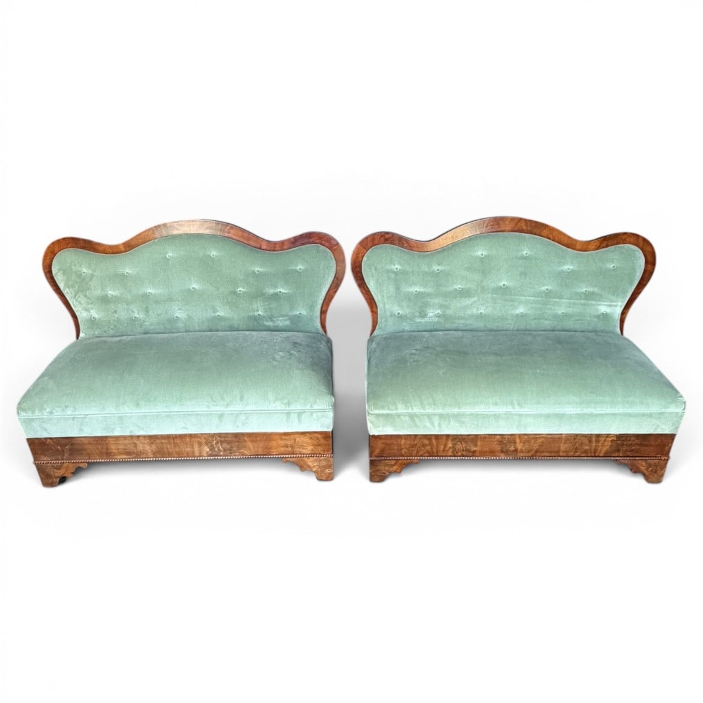 Pair of American Classical Mahogany Upholstered Settees, Circa 1840: Pair of American Classical mahogany upholstered settees, circa 1840, each with shaped serpentine crest rail and continuous scrolled mahogany frame surrounding a button-tufted back and broad