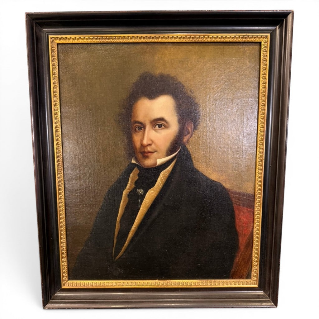 American School, Portrait of a Gentleman, C. 1830: Oil on canvas, American School, likely New York or Northeastern United States, circa 1830?1840, depicting a seated gentleman in black coat, high collar, yellow waistcoat, black cravat, and jeweled sti