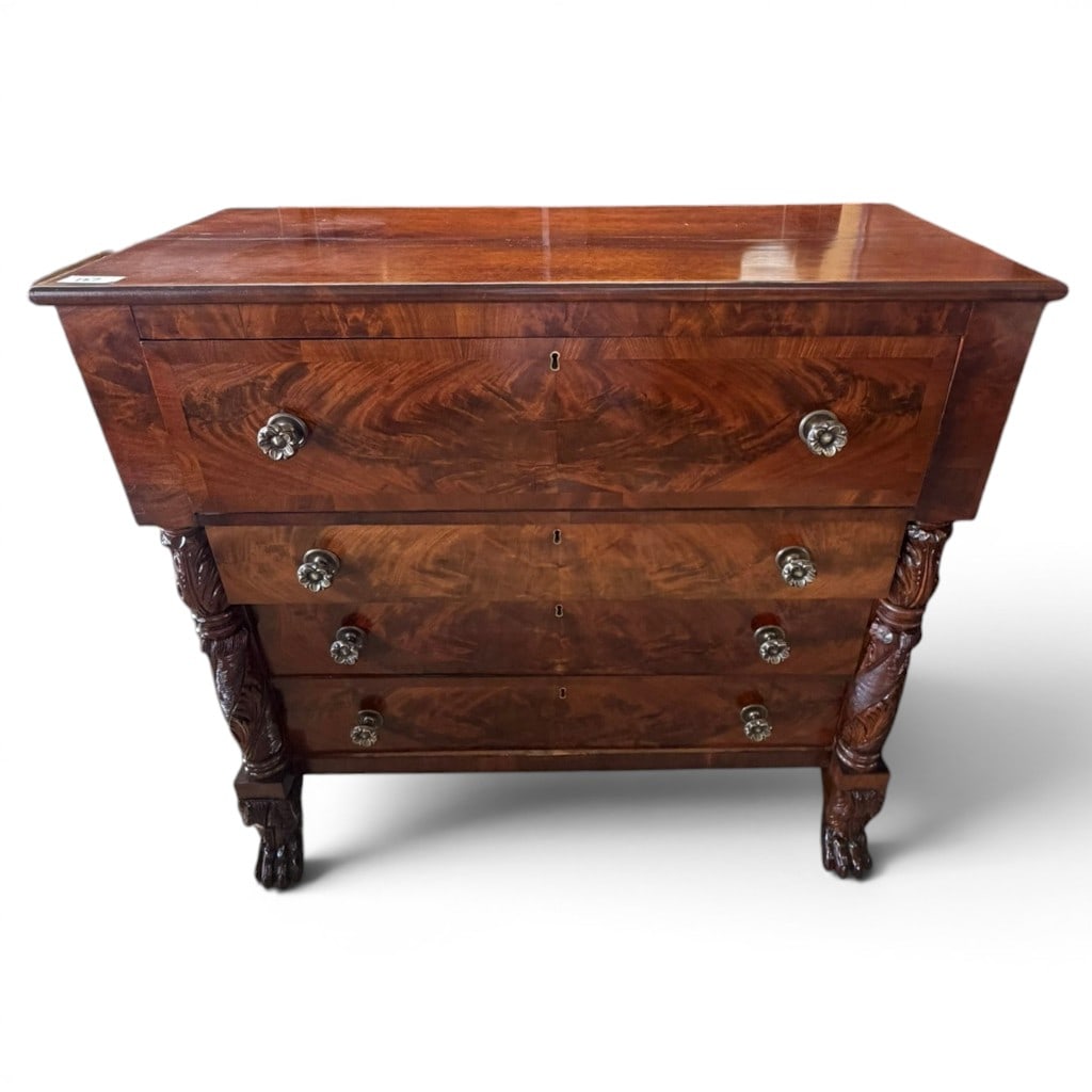 American Classical Flame Mahogany Chest of Drawers, c. 1825-1840: An American Classical chest of drawers, circa 1825-1840, probably New York or Philadelphia, crafted in richly figured flame and crotch mahogany with crossbanded case decoration and bold architectural
