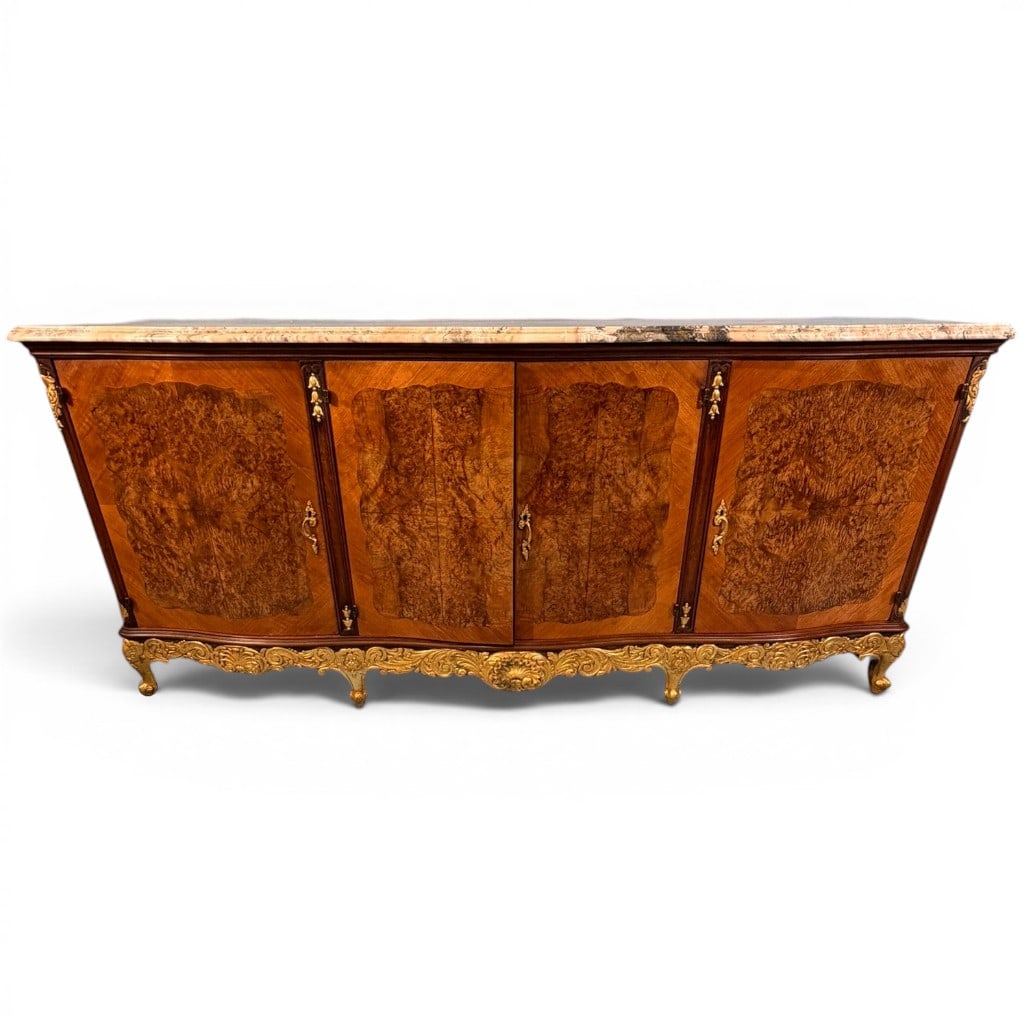 Louis XV Style Marble-Top Sideboard / Buffet: Louis XV style marble-top sideboard or buffet, a substantial large-scale case piece with shaped serpentine front and conforming variegated marble top. The cabinet features four doors with highly
