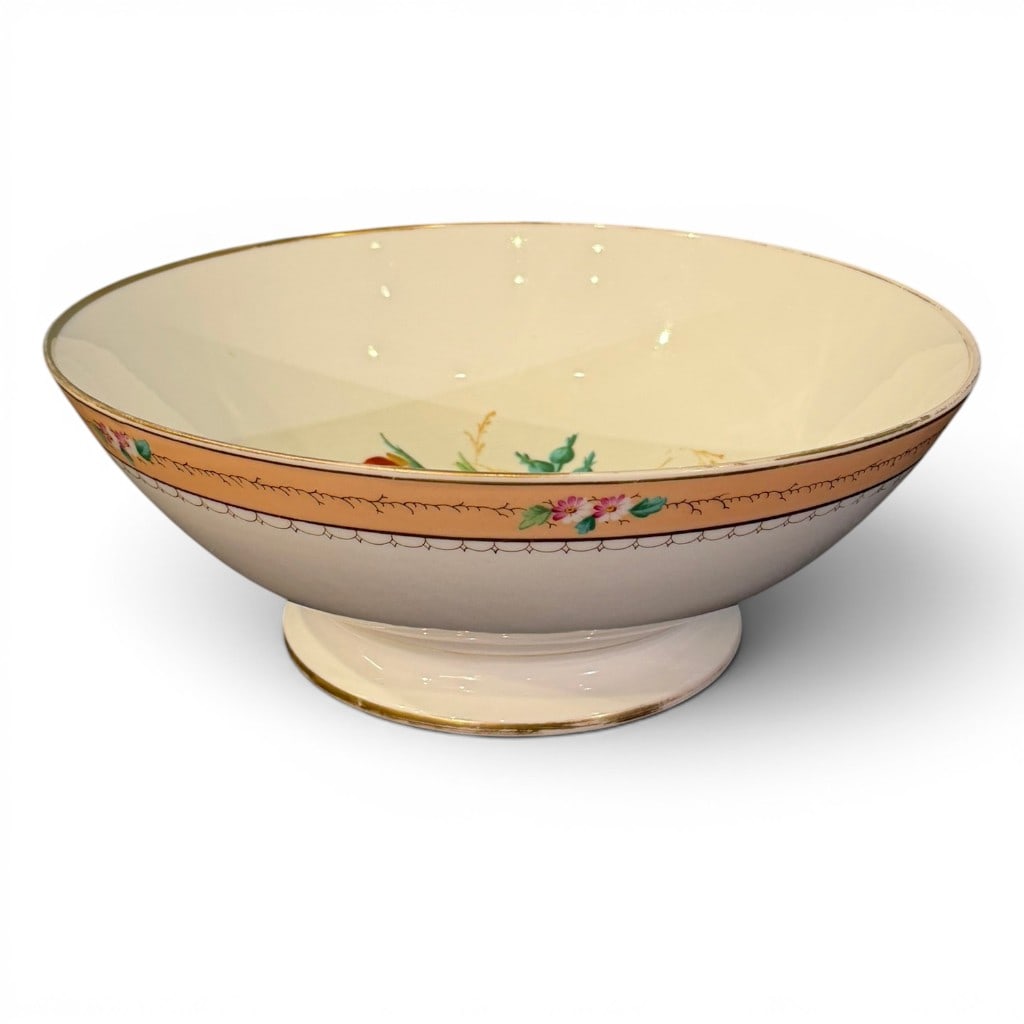 Large English Porcelain Floral-Decorated Punch Bowl, late 19th c.: Large English porcelain punch bowl or centerpiece bowl, late 19th/early 20th century, of wide circular form raised on a short foot, decorated with a peach-ground border with floral reserves, gilt rim