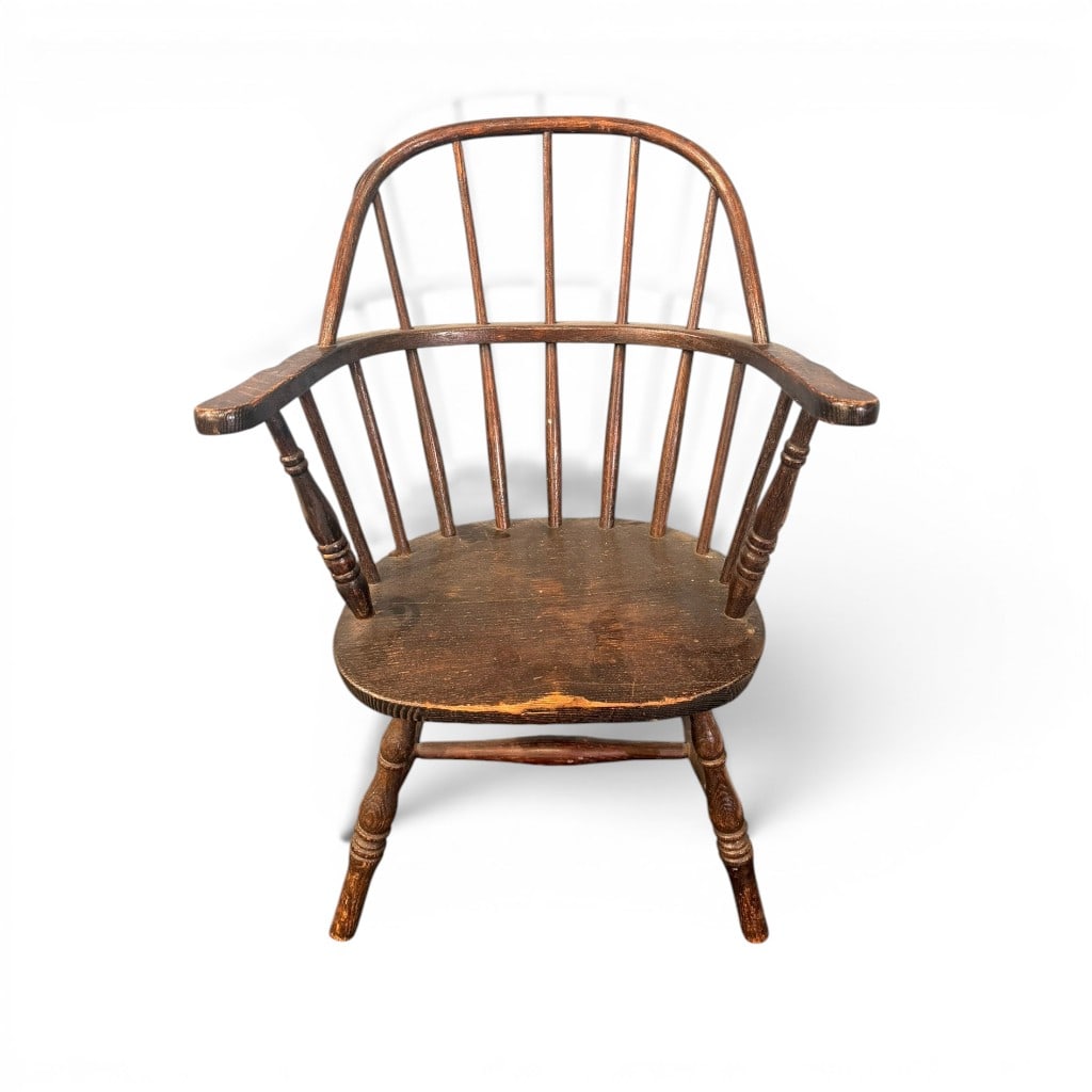 19th Century Childs Windsor Chair or Salesmans Sample: 19th century childs Windsor armchair or salesmans sample, with bowed crest rail, shaped continuous arms, turned arm supports, saddle-form plank seat, splayed turned legs, and stretcher base. The